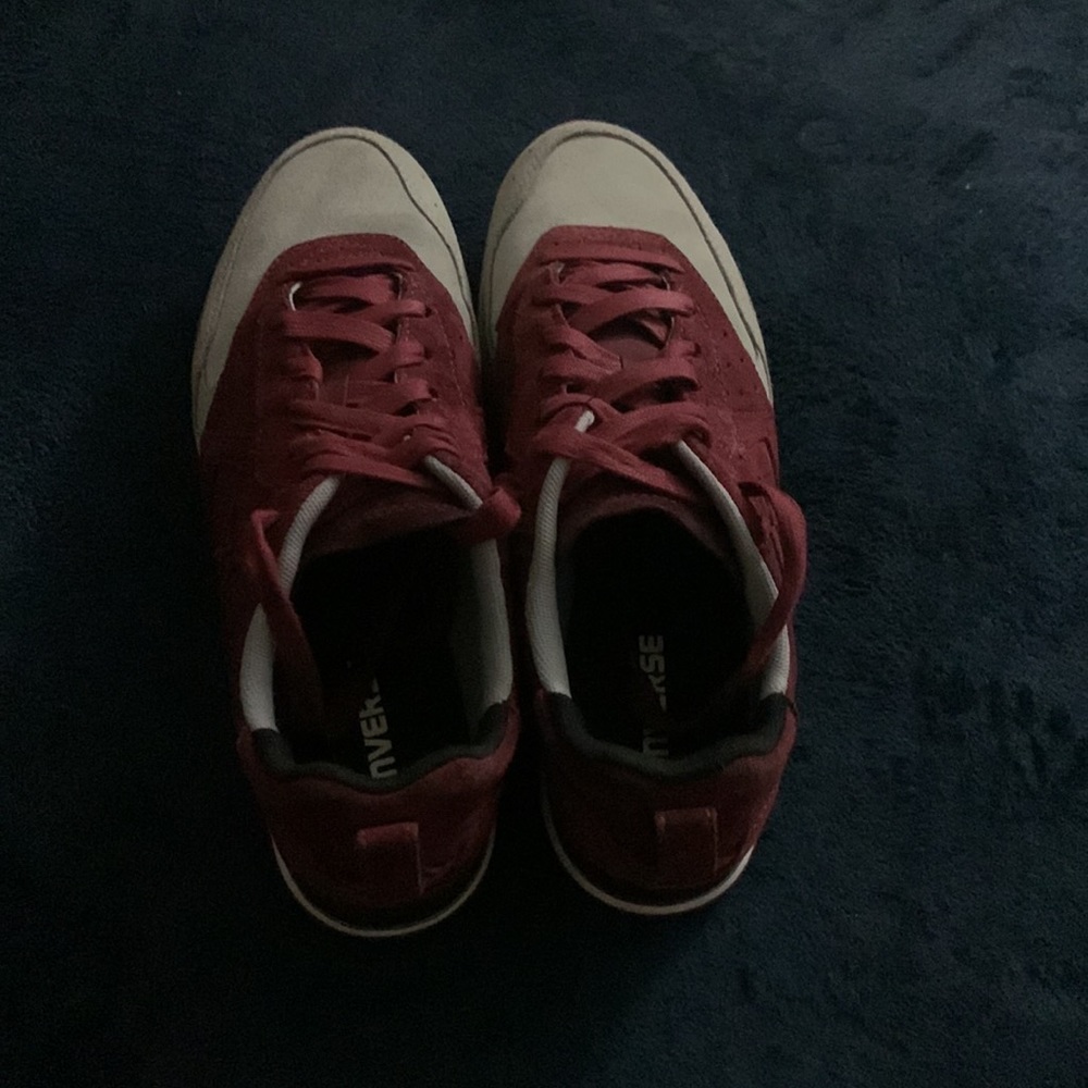 Gray and burgundy converse shoes